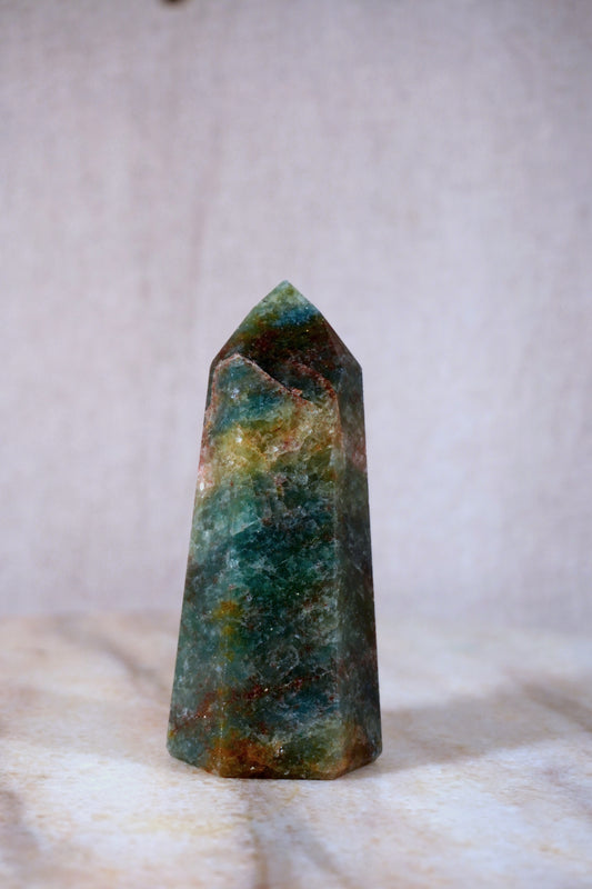 pointed_green_quarz_pointed_tower_special_unique_brazilian_stone_mineral_crystal_european_translucent_sparkly_home_decor_altar_stone banded stone rock close up brown and glittler rock red hematite green banded