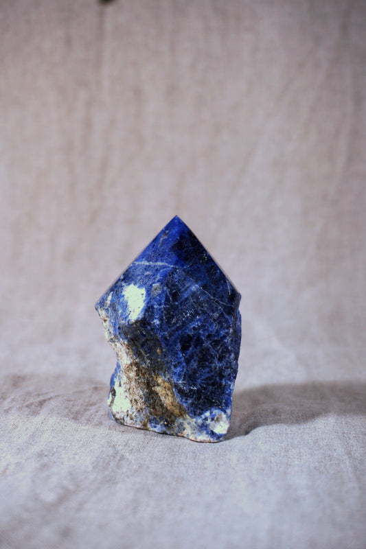candle_palo_santo_altar_sodalite_raw_rough_and_polished_natural_brazilian_mined_stone_mineral_milky_large_altar_stone_home_decor white deep blue rock 